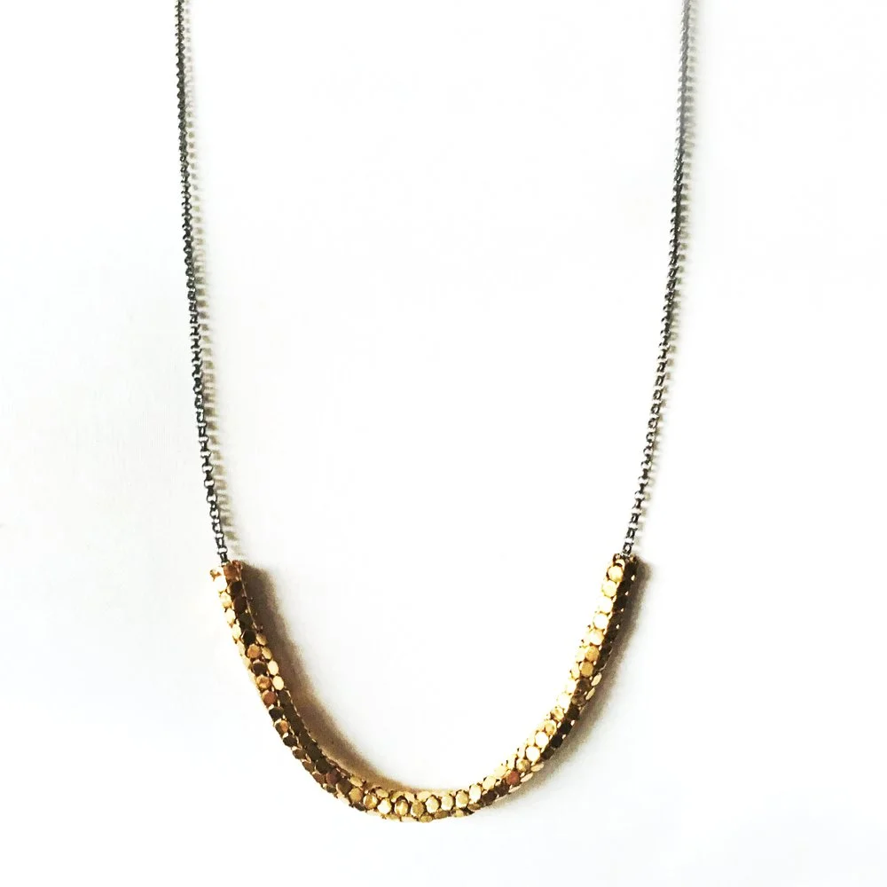 Metal Mesh Roller Necklace | oxidized sterling silver wrapped with gold vintage mesh from a reclaimed purse. Handmade by Maral Rapp | www.maralrapp.com