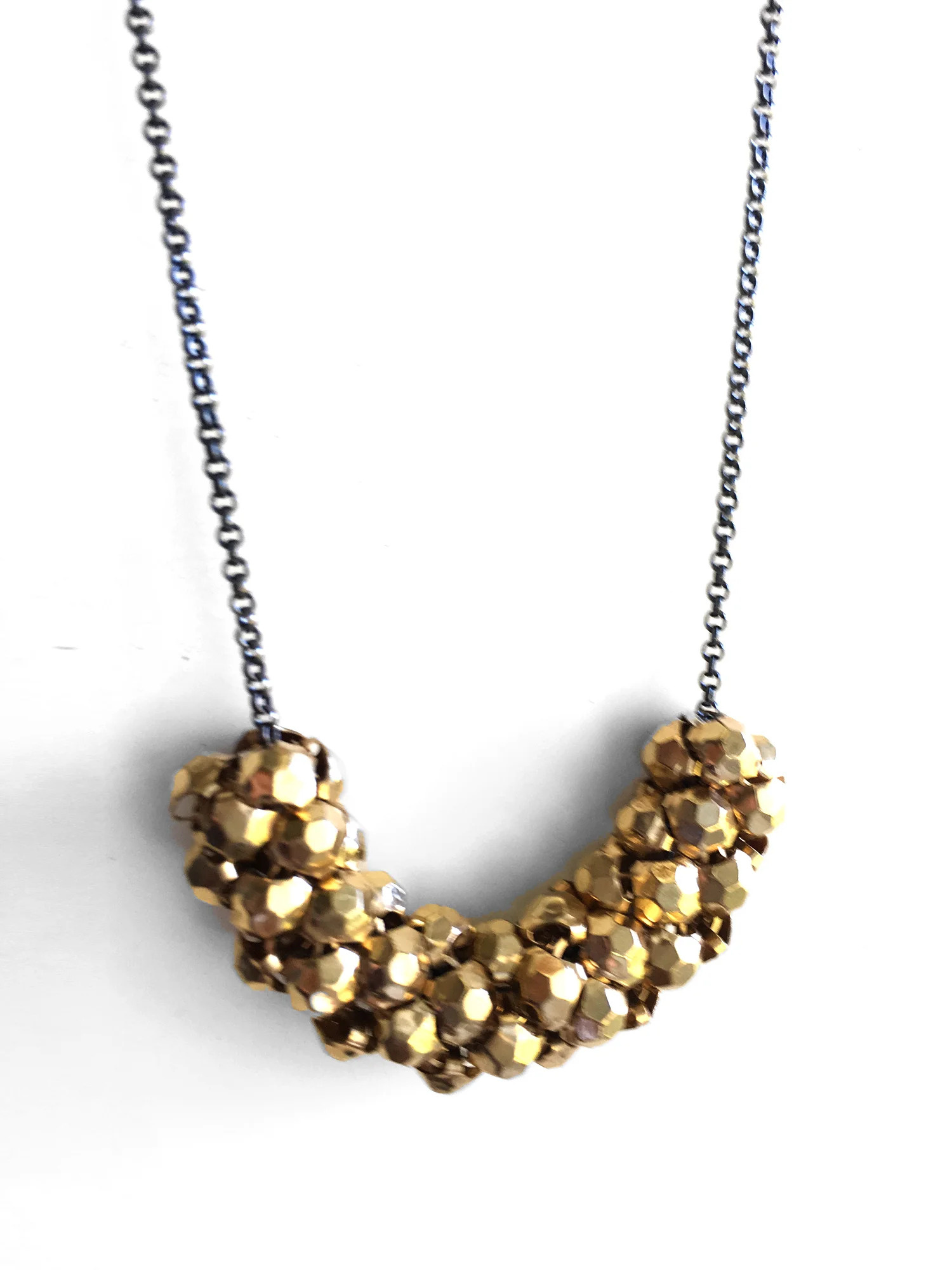 Stud Mesh Roller Necklace | oxidized sterling silver with reclaimed vintage gold metal mesh elements. Handmade by Maral Rapp | www.maralrapp.com