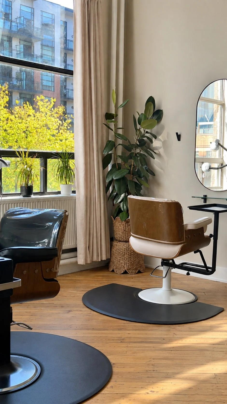 A styling chair and station by the window inside the Lovoux studio