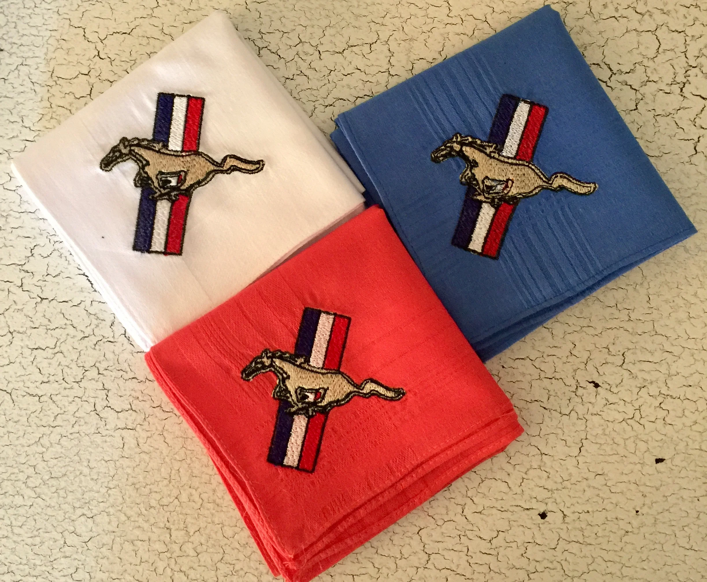 mustang logo trio folded.jpg