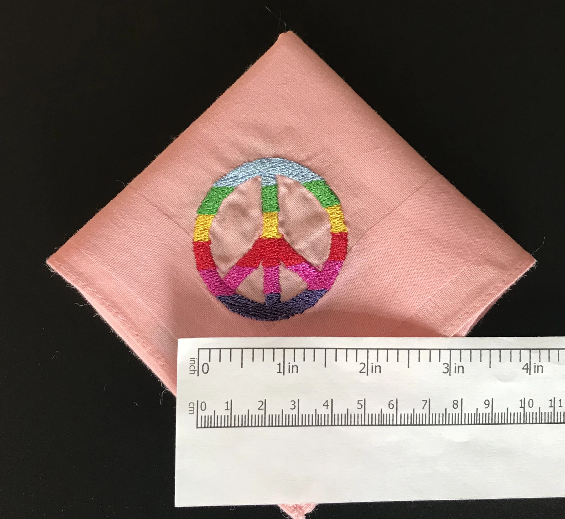 Peace CND mens pink quarter with ruler.jpg
