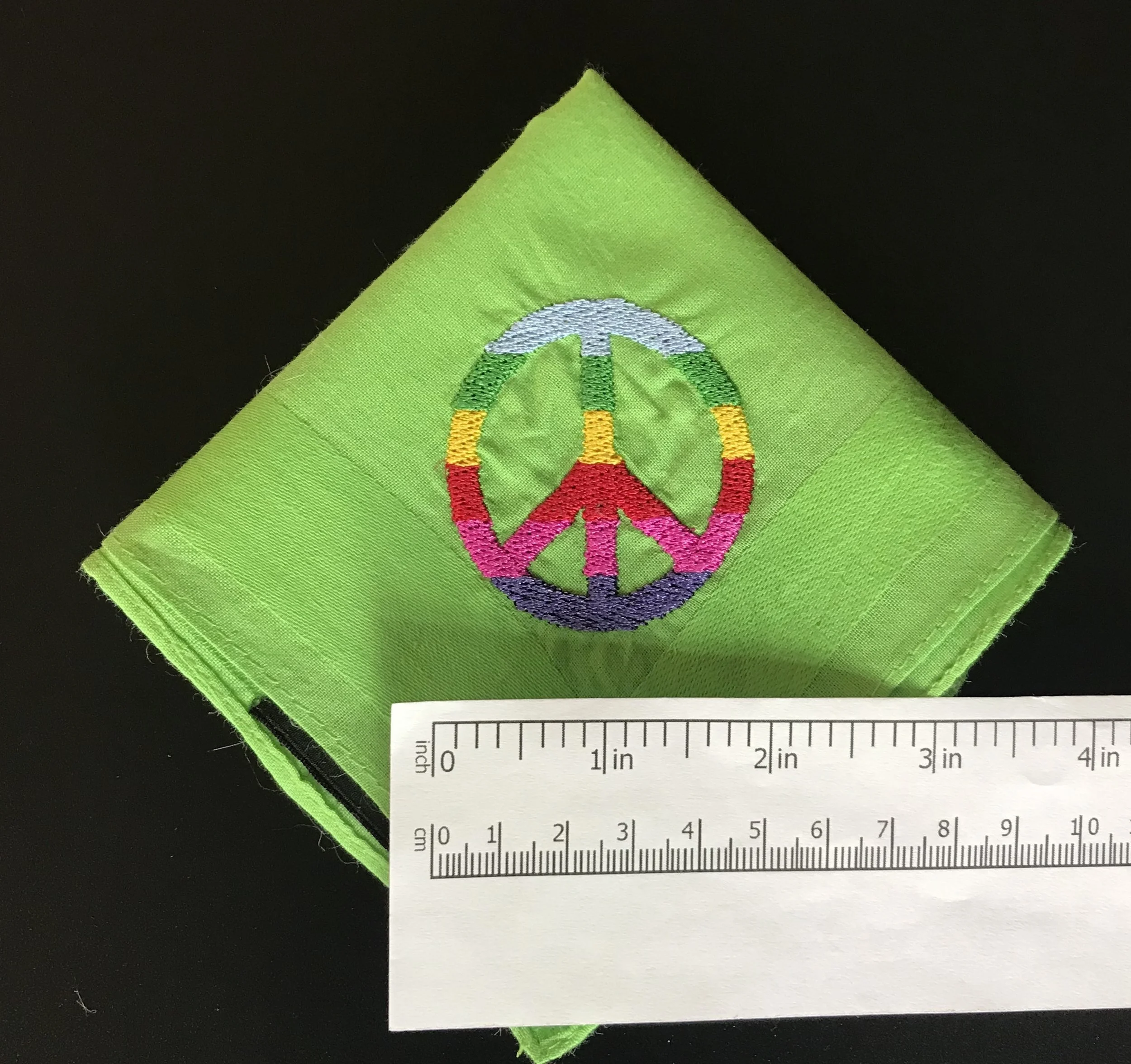 Peace CND mens green quarter with ruler.jpg