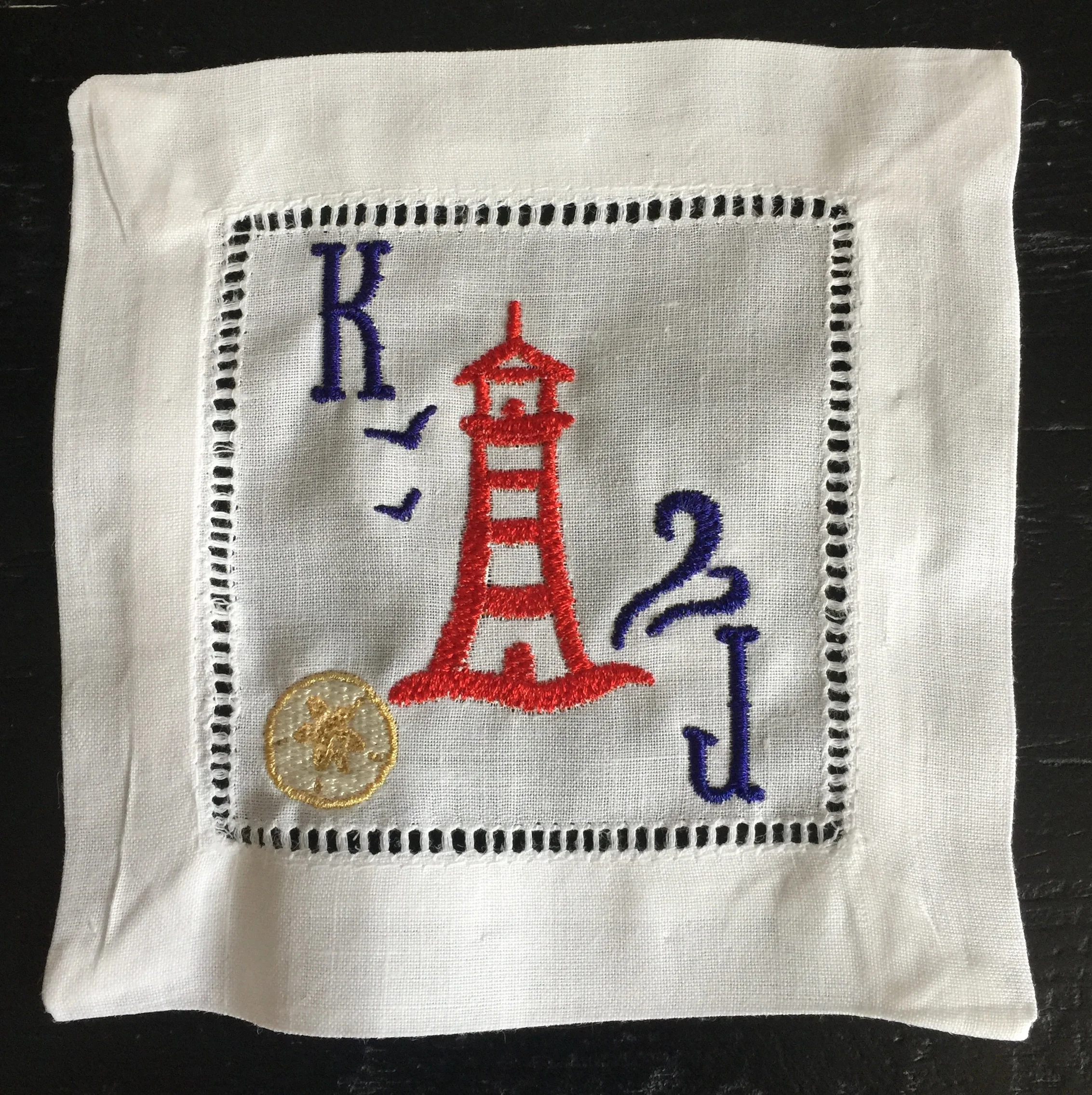 Cocktails by the Sea Lighthouse w Sand Dollar Cocktail Napkin.jpg