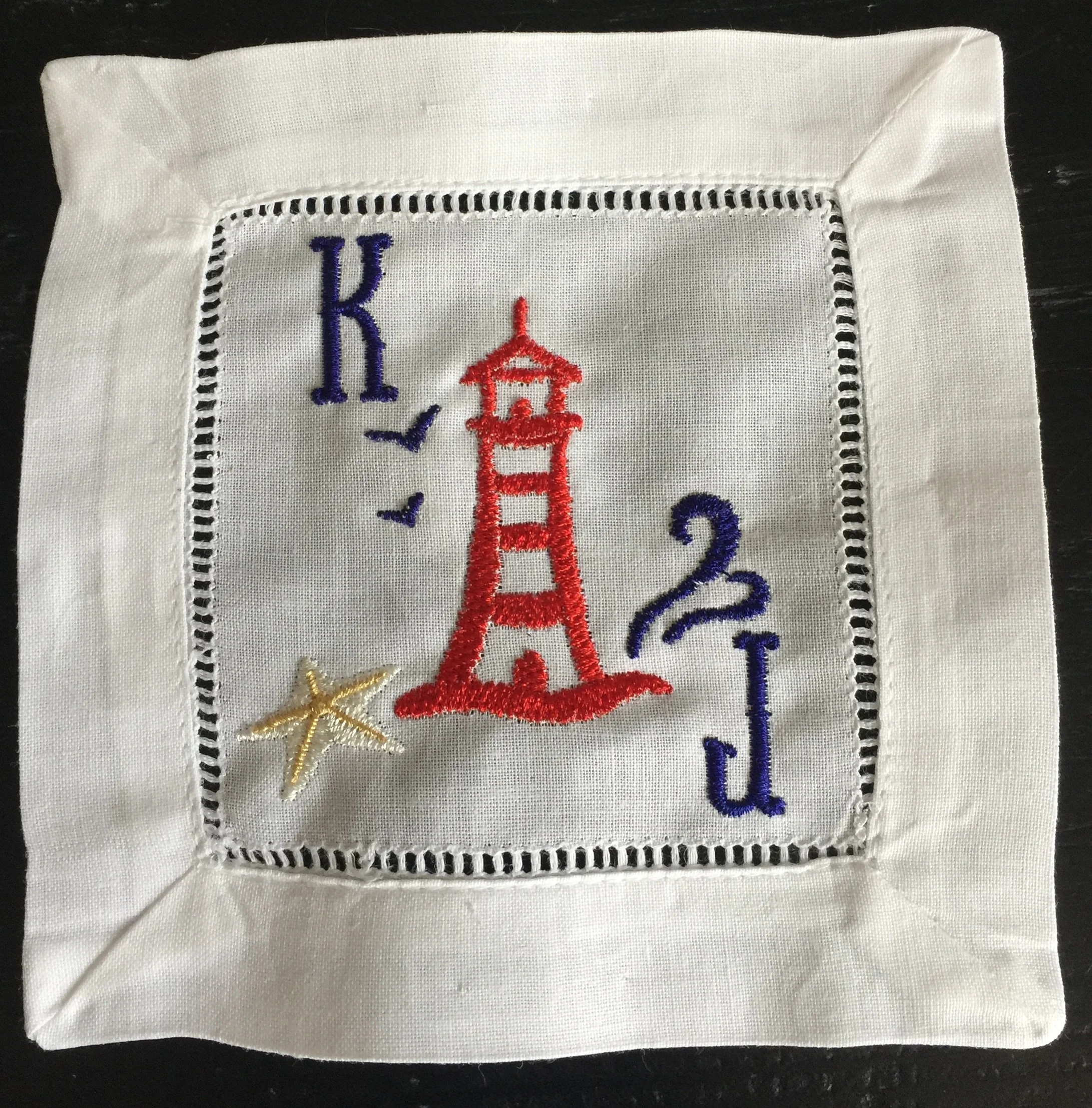 Cocktails by the Sea Lighthouse w Starfish Cocktail Napkin.jpg