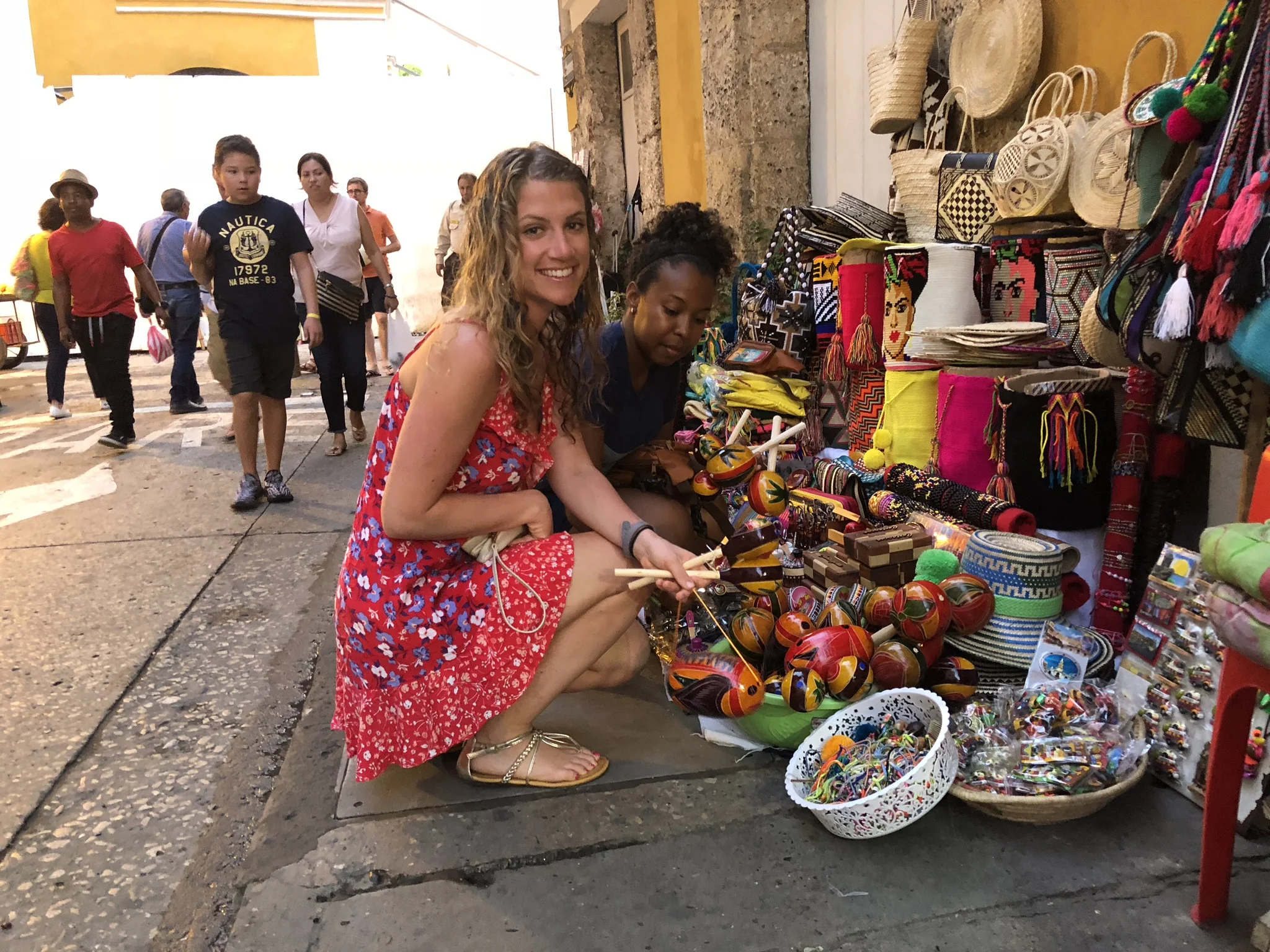 Street vendors sell endless options of jewelry, bags, shoes, toys, and other colorful things!