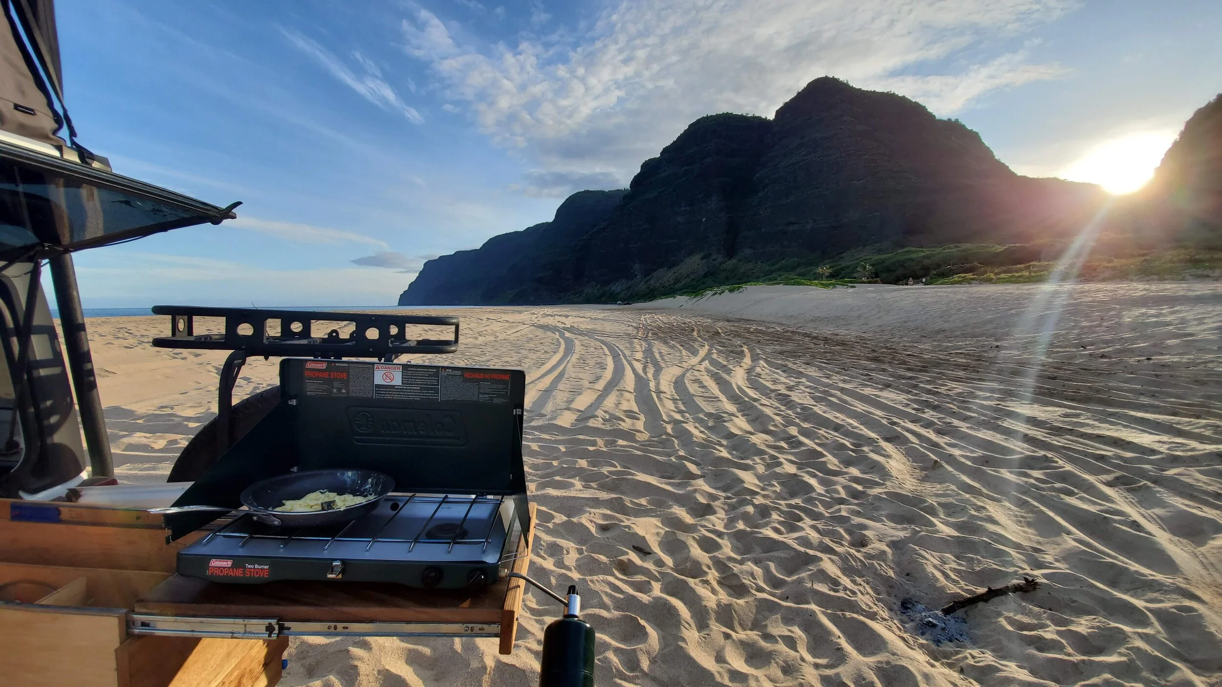 cooking breakfast during sunrise