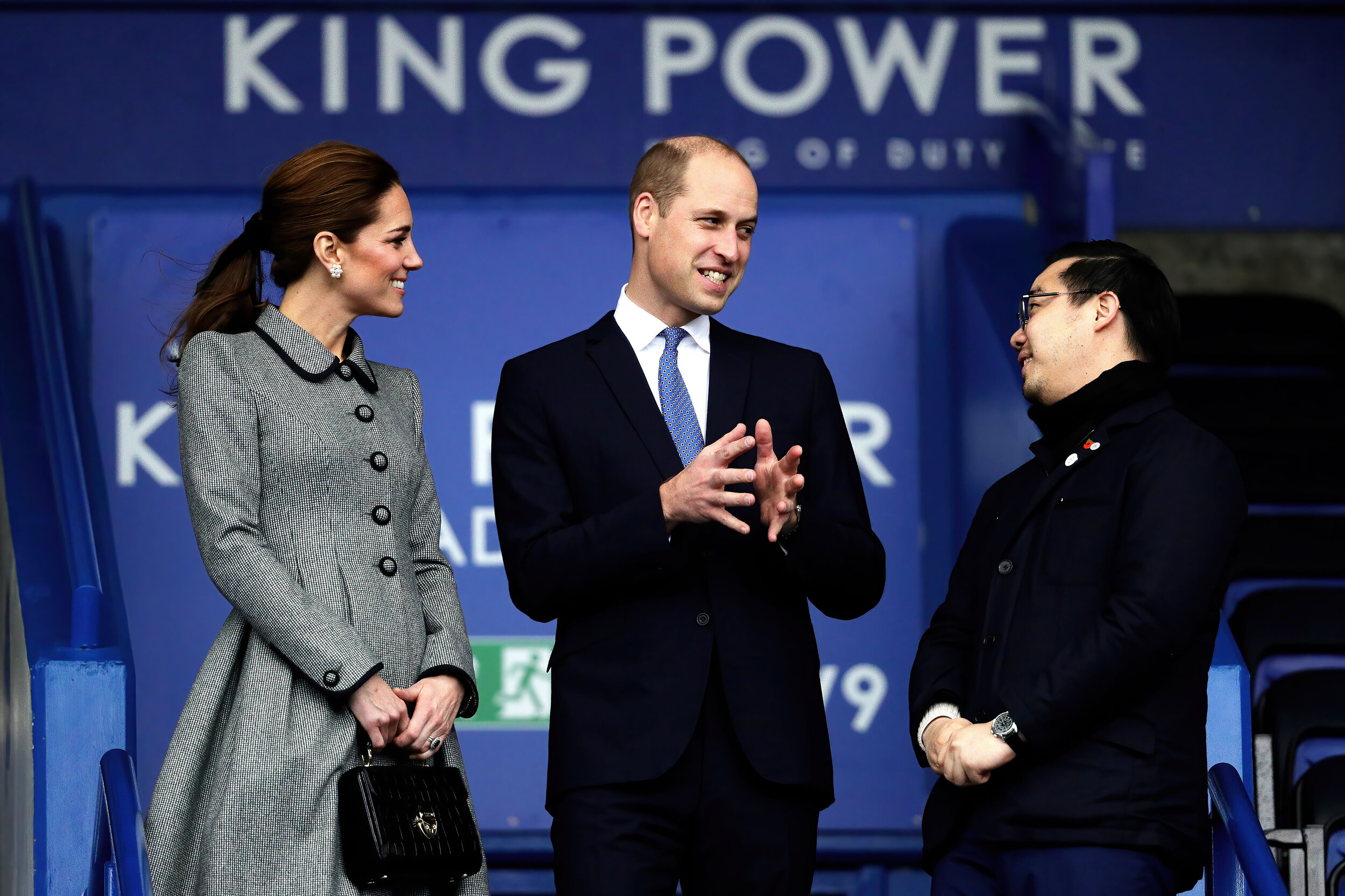  The Duke and Duchess of Cambridge speak with Aiyawatt Srivaddhanaprabha as they view the pitch from the stands at Leicester City Football ClubÕs King Power Stadium, during a visit to Leicester to pay tribute to those who were killed in the helicopte