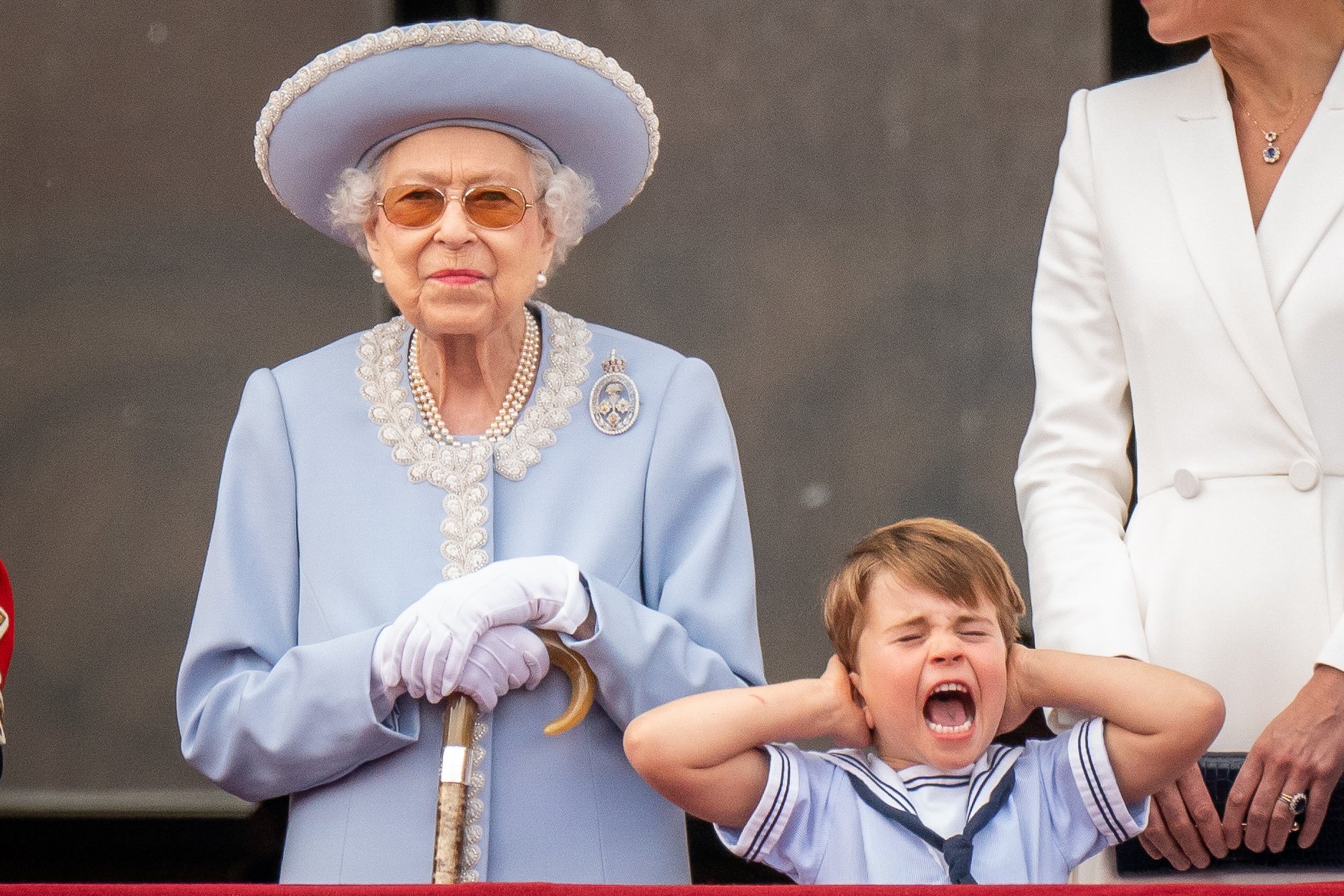  Queen Elizabeth II and Prince Louis on the balcony of Buckingham Palace after the Trooping the Colour ceremony at Horse Guards Parade, central London, as the Queen celebrates her official birthday, on day one of the Platinum Jubilee celebrations. Pi