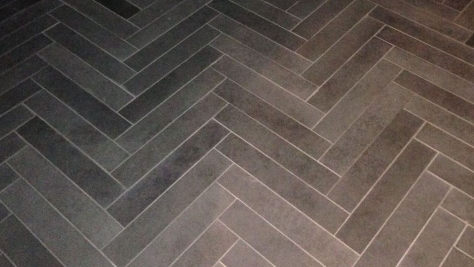 Dark Gray Basalt in Herringbone Format | 2" x 12"