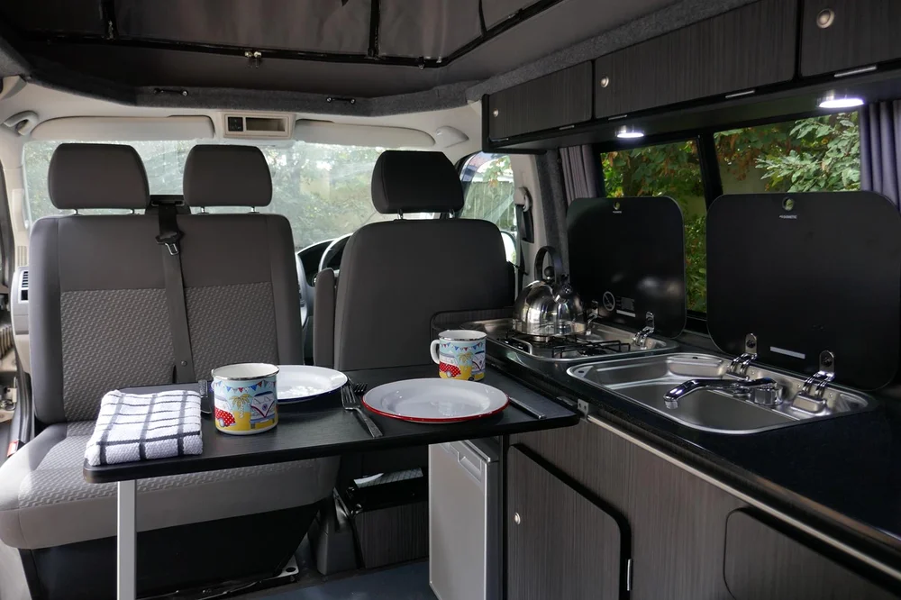 Minivan With Table And Swivel Seats