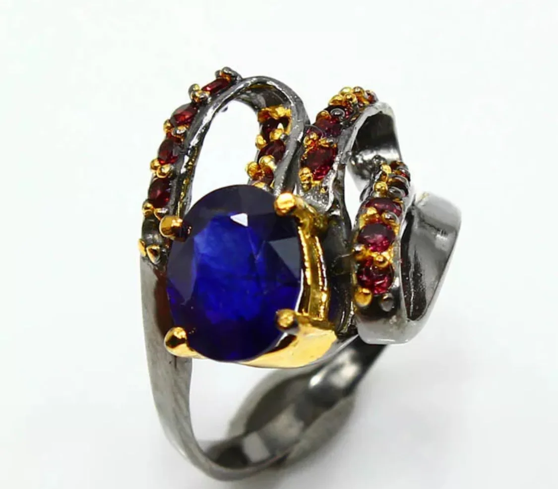 007 GA-R Whirlagig whirls Of rubies and large sapphire 
