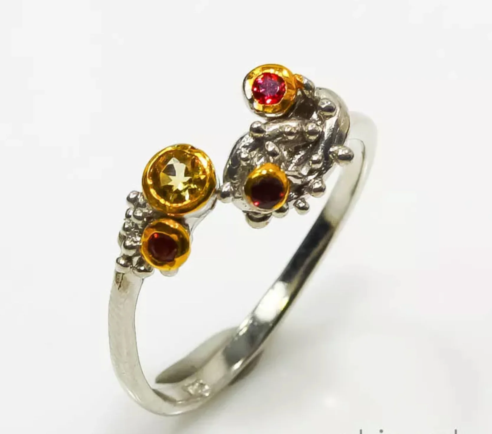 06765-R-GA- Three Ruby eyes with Amethysts and Citrene