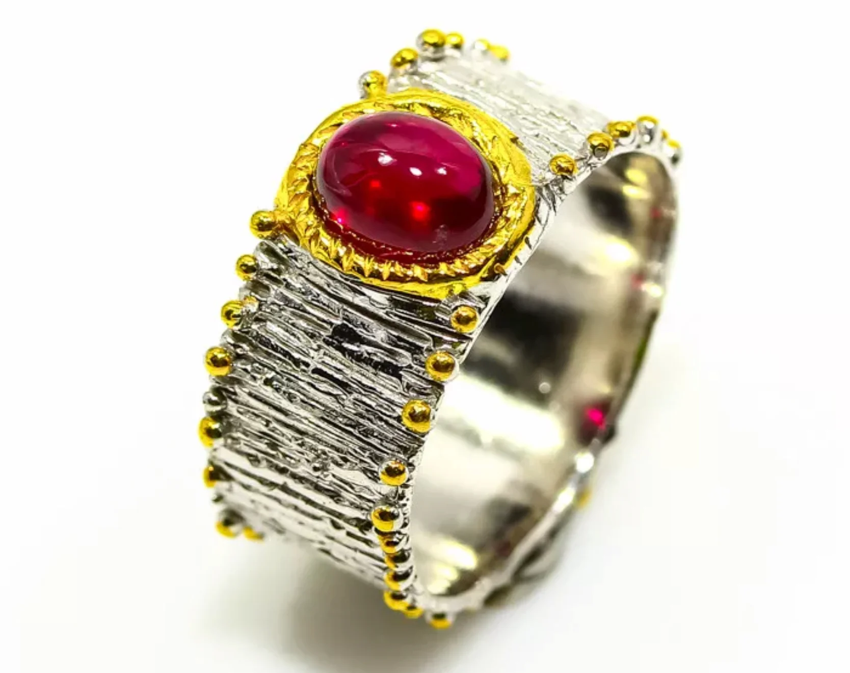 1345-R-GA-Rubies one large cabochon gold trim on Sterlingsilver