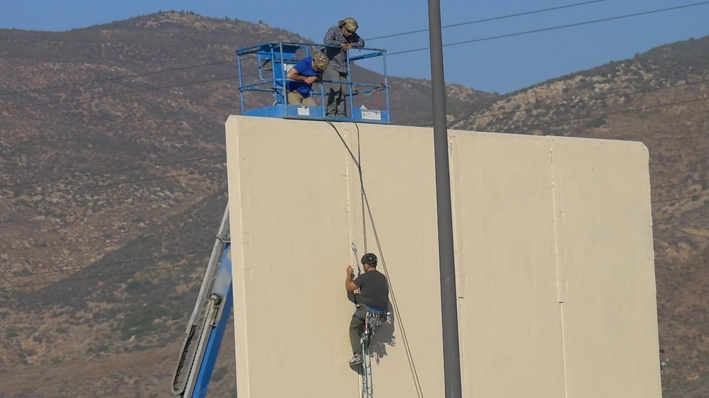 US Customs and Border Protection officials are making sure the wall prototypes cannot be breached.President Trump says he will visit the site and pick the winning design after the tests. @ BBC