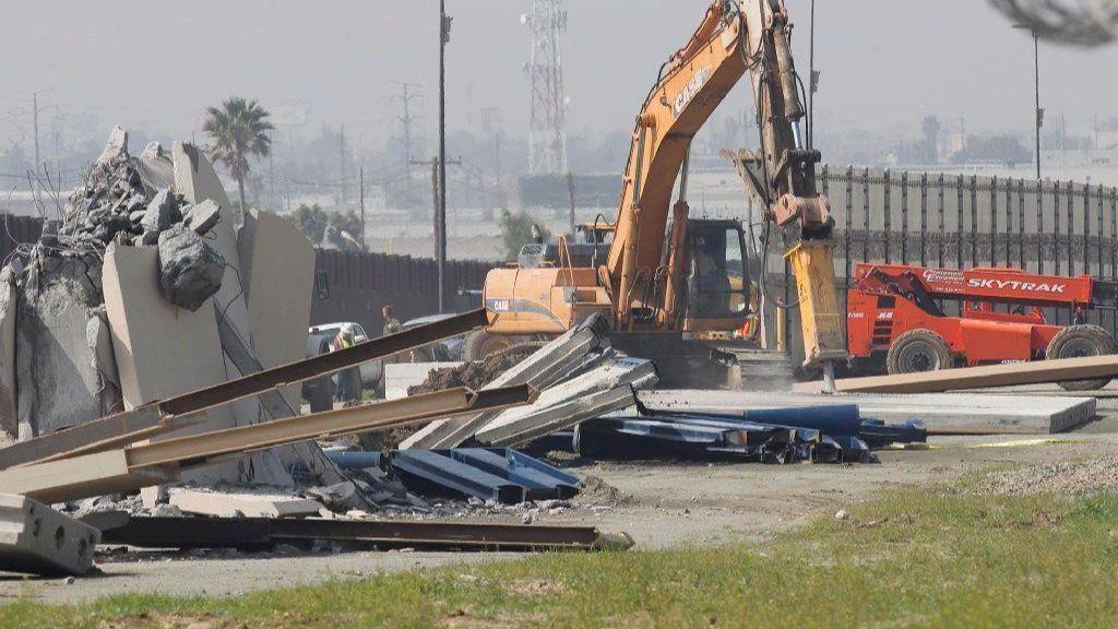 The eight bits of wall, each a 30-foot square, are being removed to make way for a border barrier construction project that is replacing 14 miles of fence and adding a little more than a mile of new structure. @ LA Times