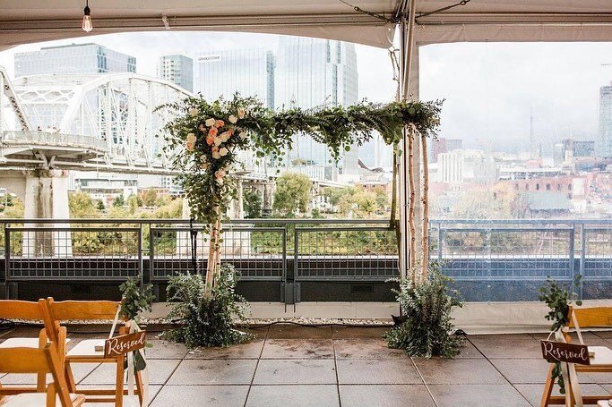 A custom ceremony arbor with gorgeous florals and a skyline backdrop. Swipe to see the happy couple and those city lights!
.
.
.
.
.
#nashville #nashvillewedding #nashvilleweddingvendors #nashvilleweddingplanner #thebridgebuilding #weddinginspiration