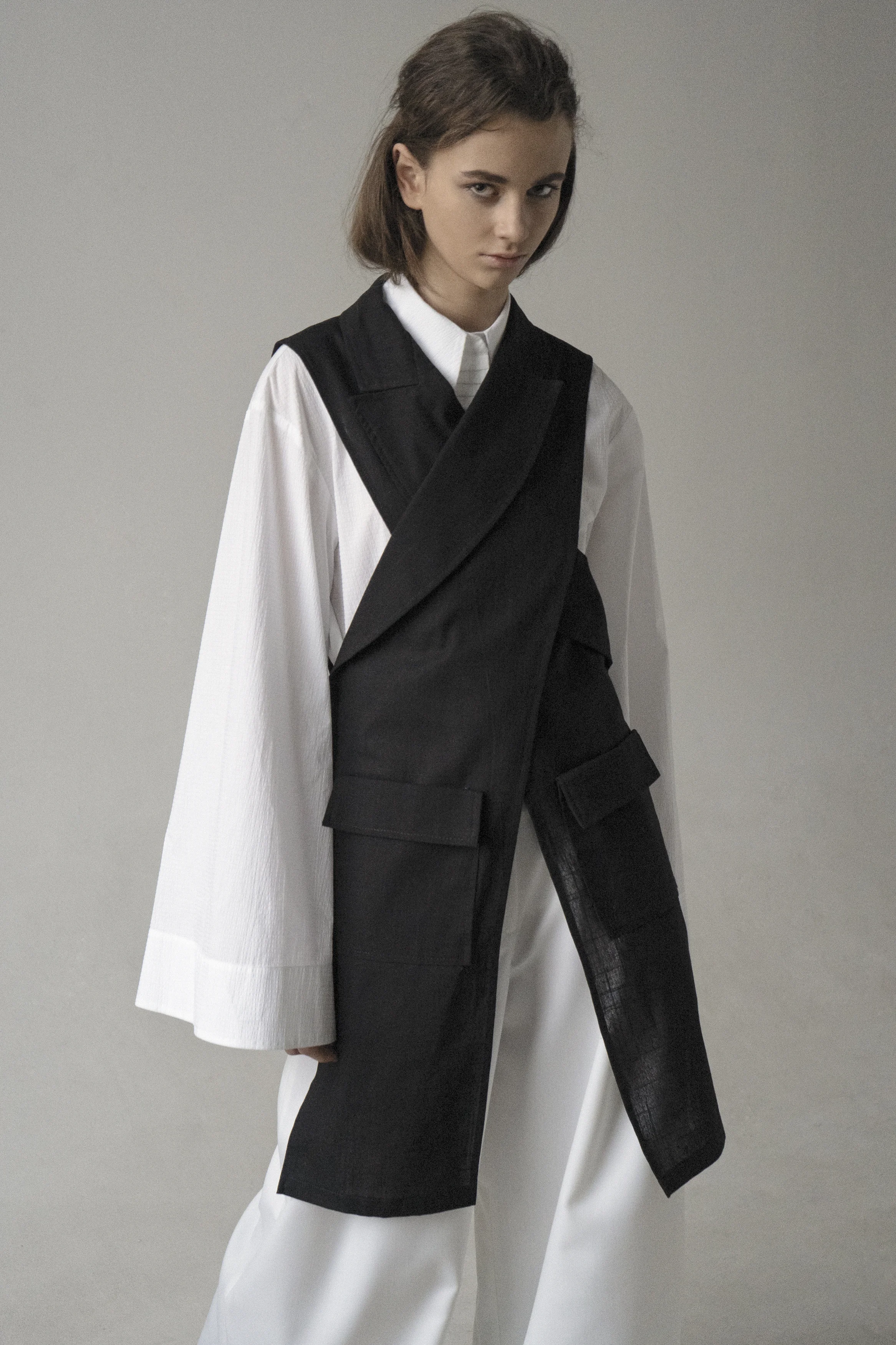 km-by-lange-black-criss-cross-sleeveless-jacket-0003.jpg