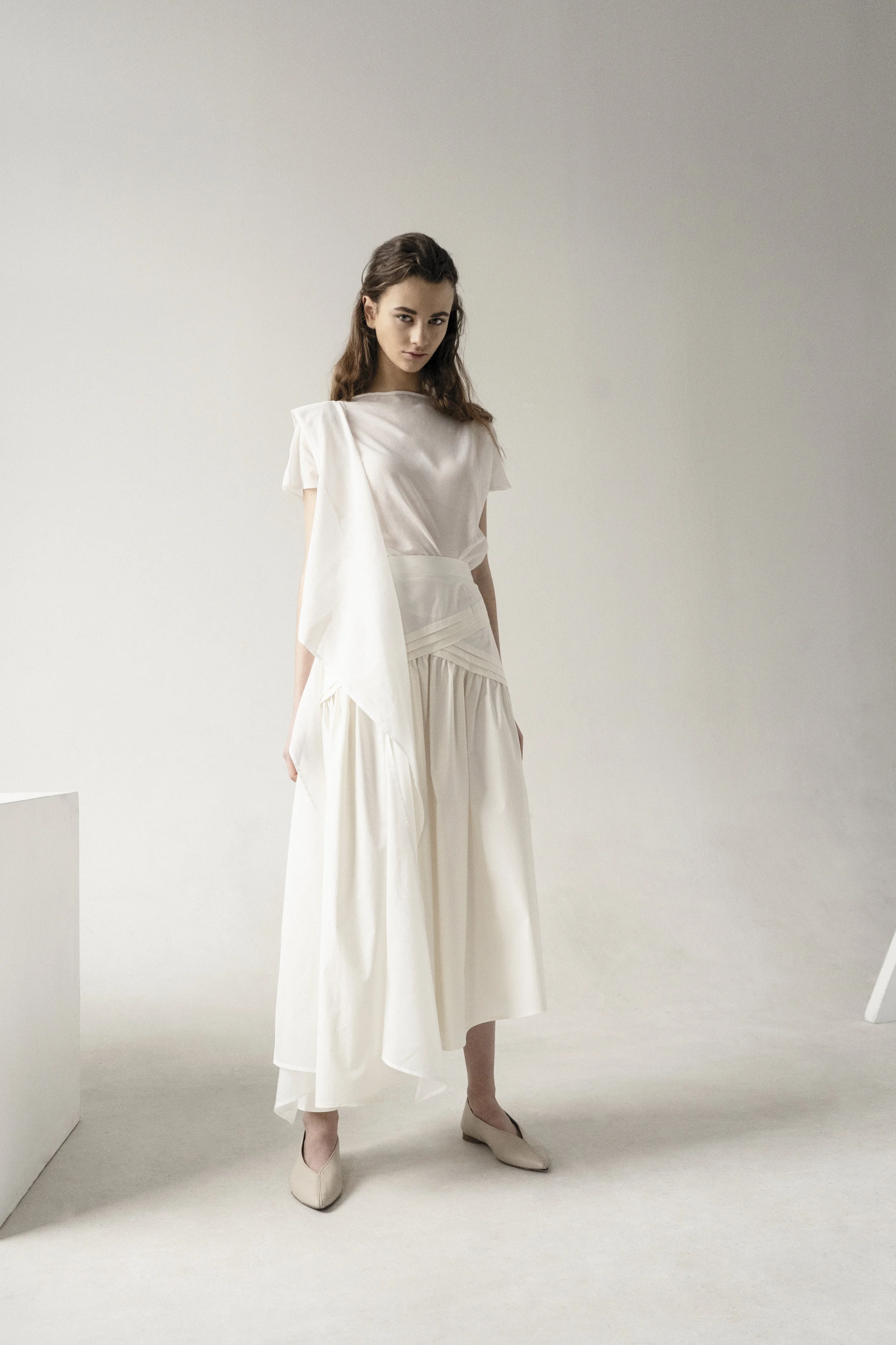 CREAM ASYMMETRIC SKIRT