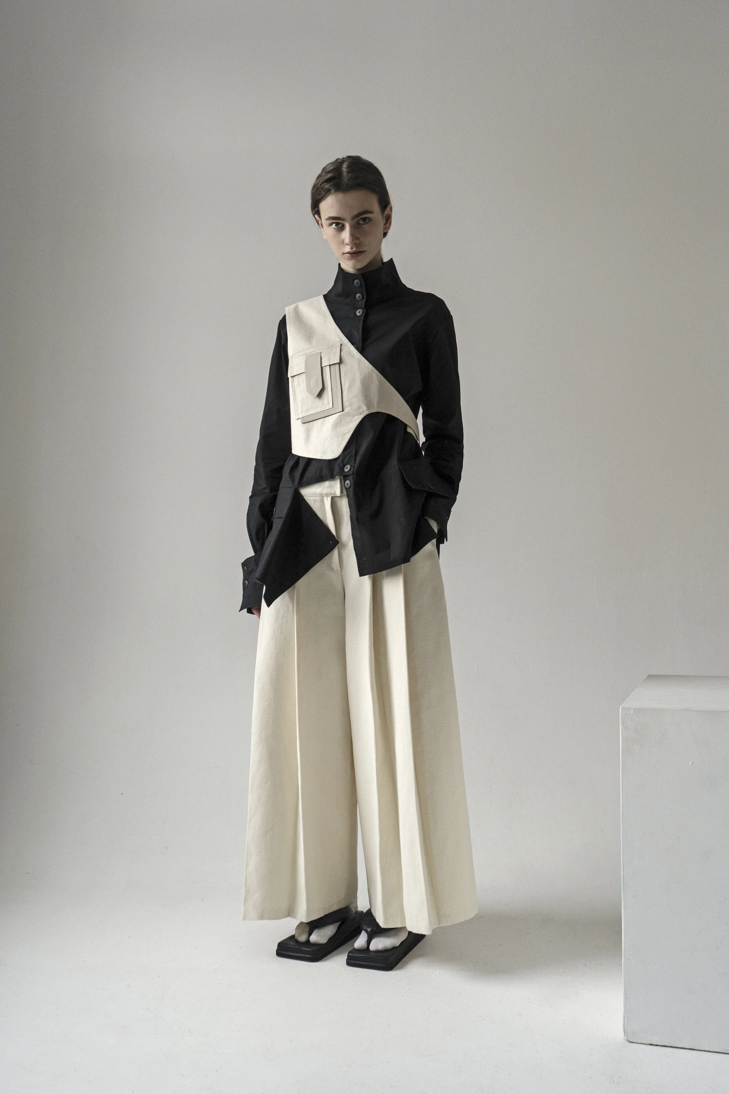 OFF WHITE ASYMMETRICAL VEST — K M by L A N G E