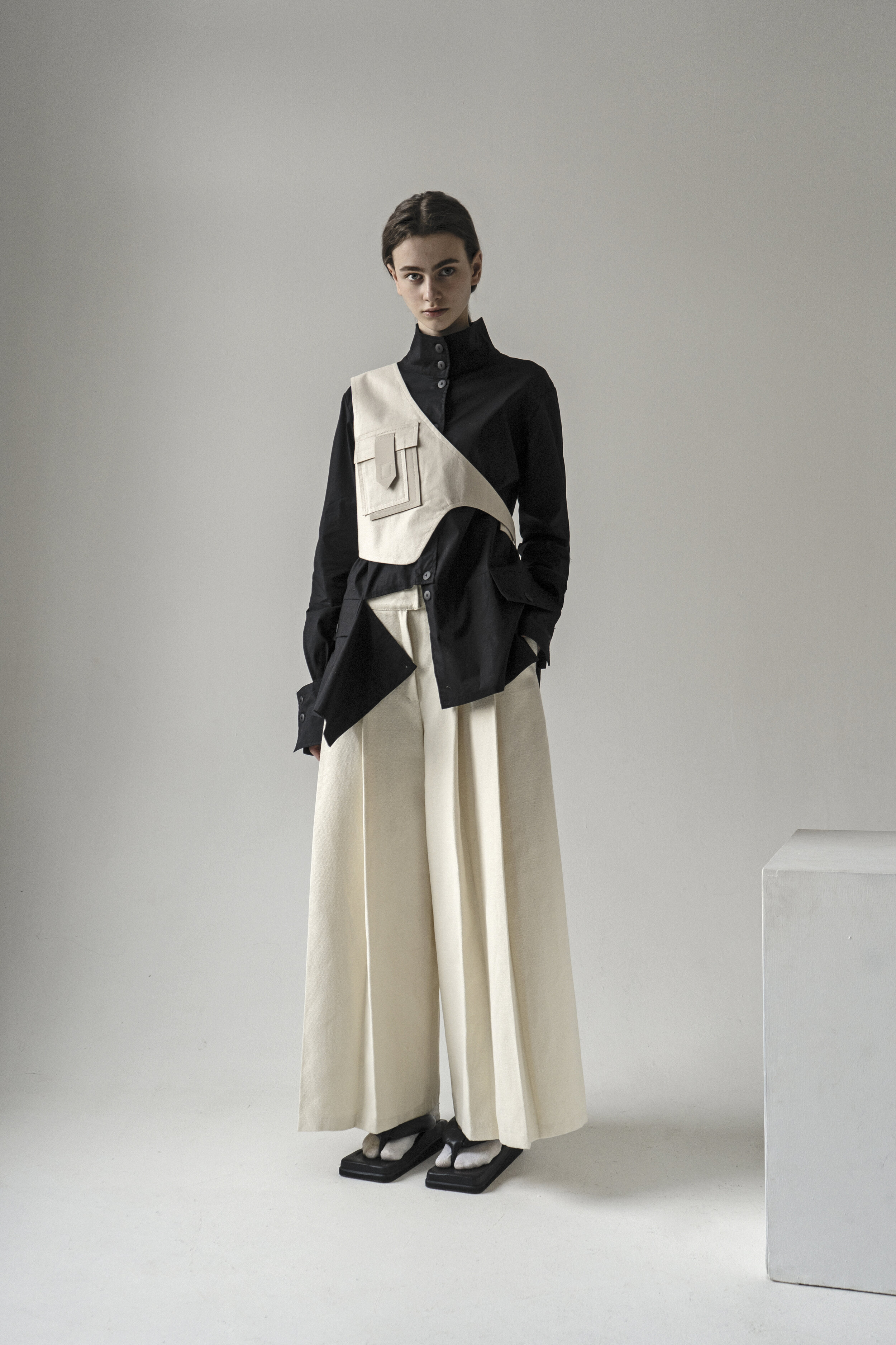 OFF WHITE ASYMMETRICAL VEST