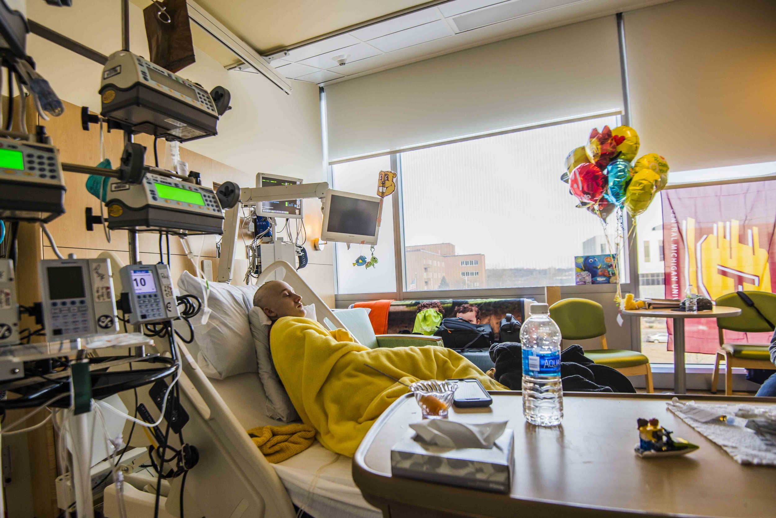  22-year-old Central Michigan University senior Kyle Tanner lays in his room, March 4, 2017 on the 4th floor of the University of Minnesota's Masonic Children Hospital. Tanner is recovering from a bone marrow transplant along with chemo and radiation