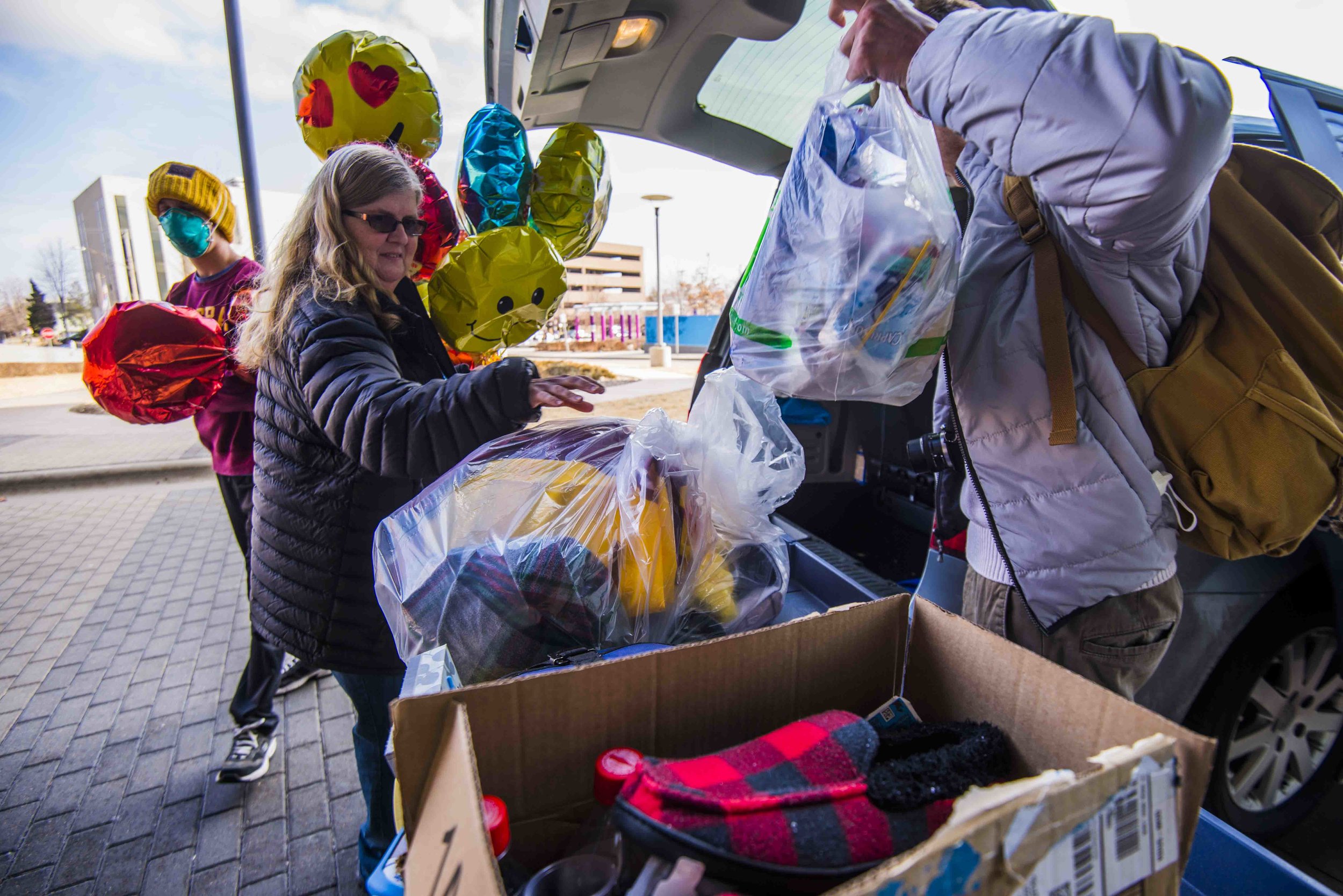  Mary Tanner, left, and Hartland junior Santino Mattioli, right, help Kyle Tanner pack to move on March 5 from the University of Minnesota Masonic Children’s Hospital into the Ronald McDonald House. “I feel like I’m just going to enjoy very small thi