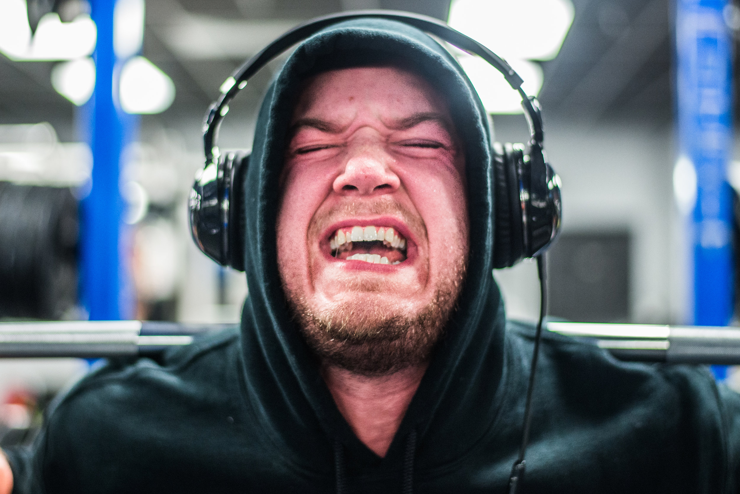  Brett yells during a squat, Oct. 9 at Mountain Town Fitness in Mount Pleasant, Michigan. "I didn't really have an opportunity to compete because of my life in the military," Brett said. "So I sat back, watched and learned, and finally got on stage a