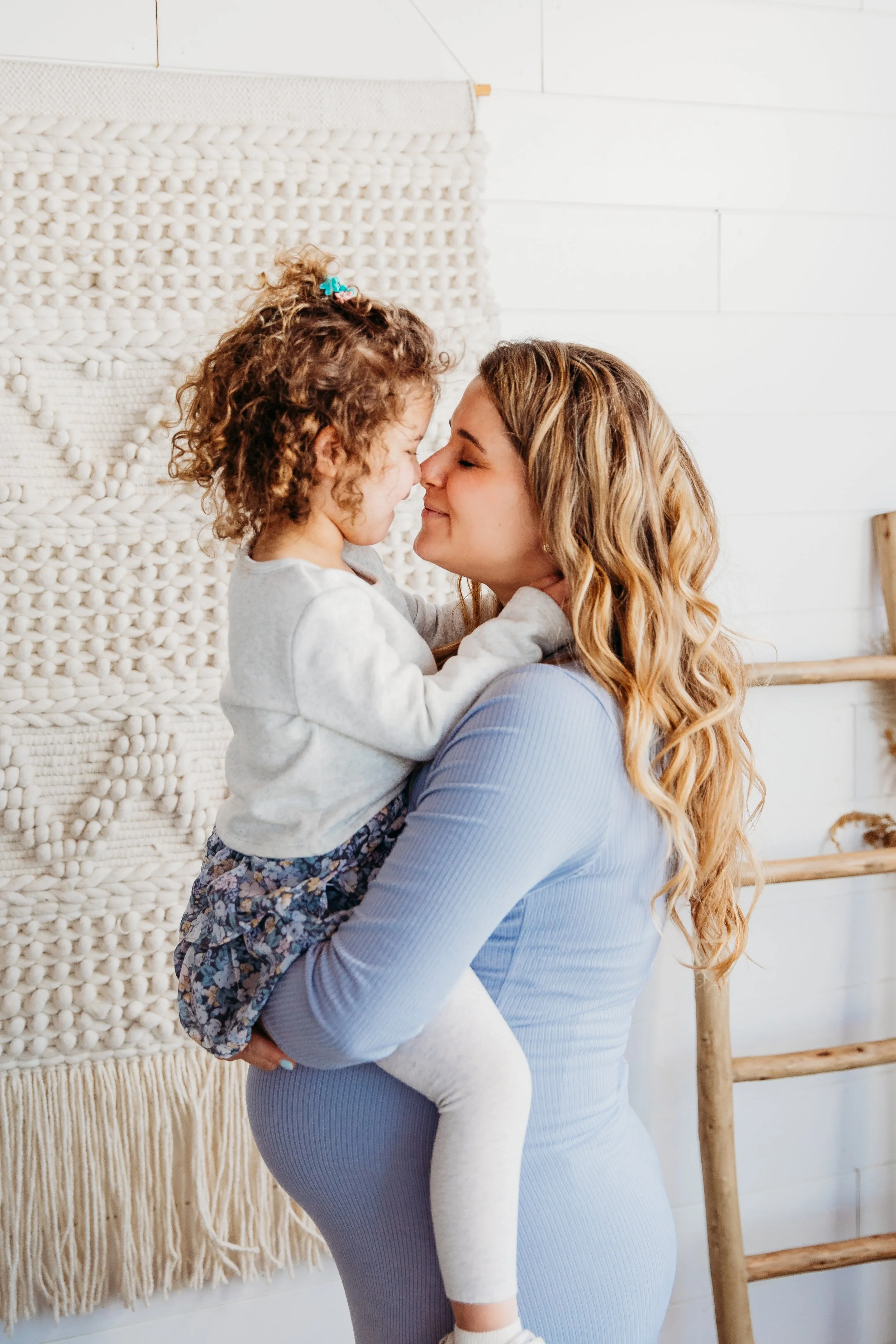 Pregnant mom with daughter at maternity session