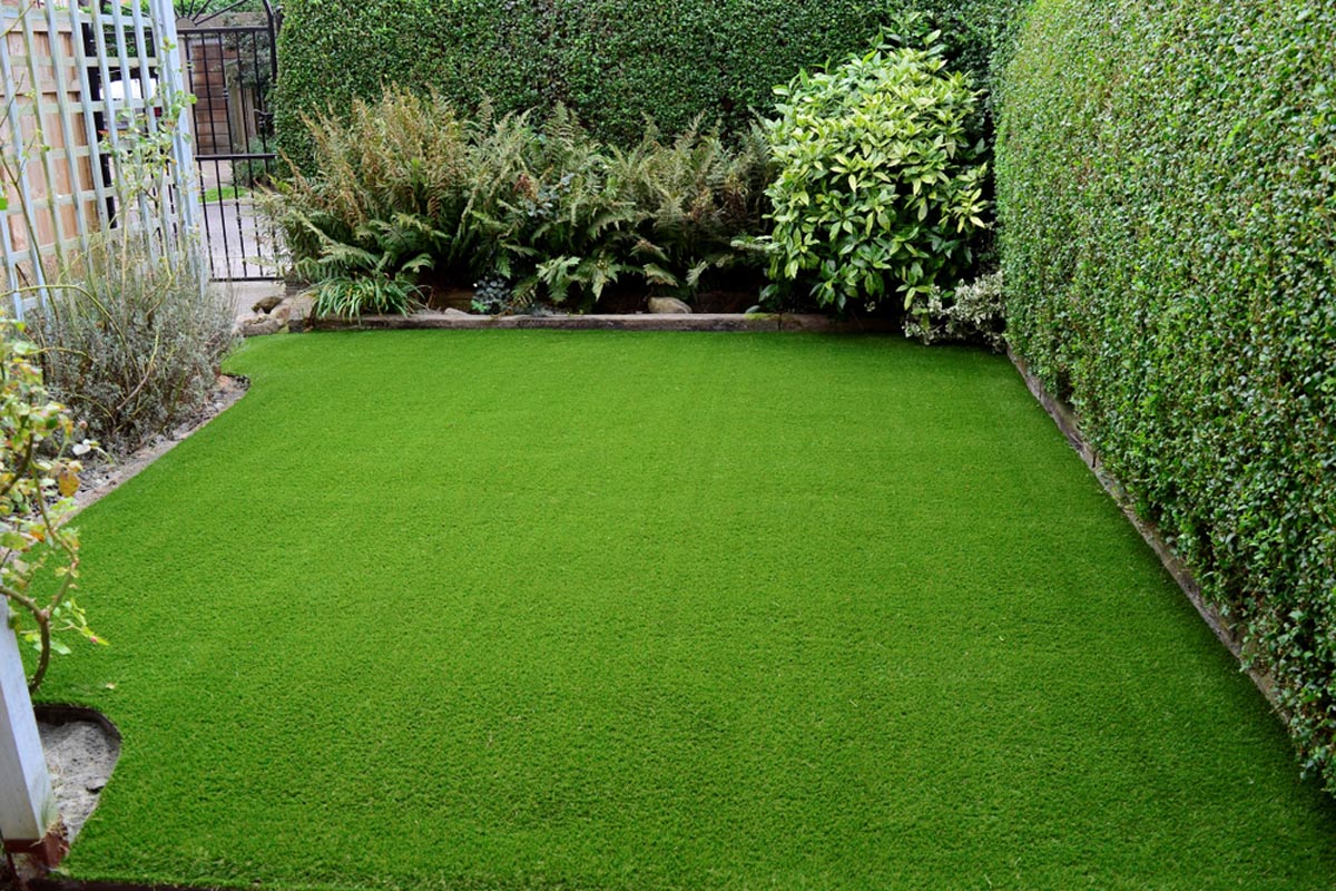 homeguide-new-artificial-turf-installation-in-residential-backyard.jpg