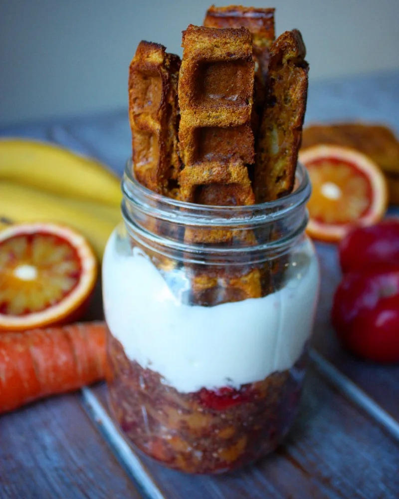 Antioxidant-rich Pumpkin Protein Waffle Sticks dipped in layered Yogurt and Blood Orange & Plum Chia Jam