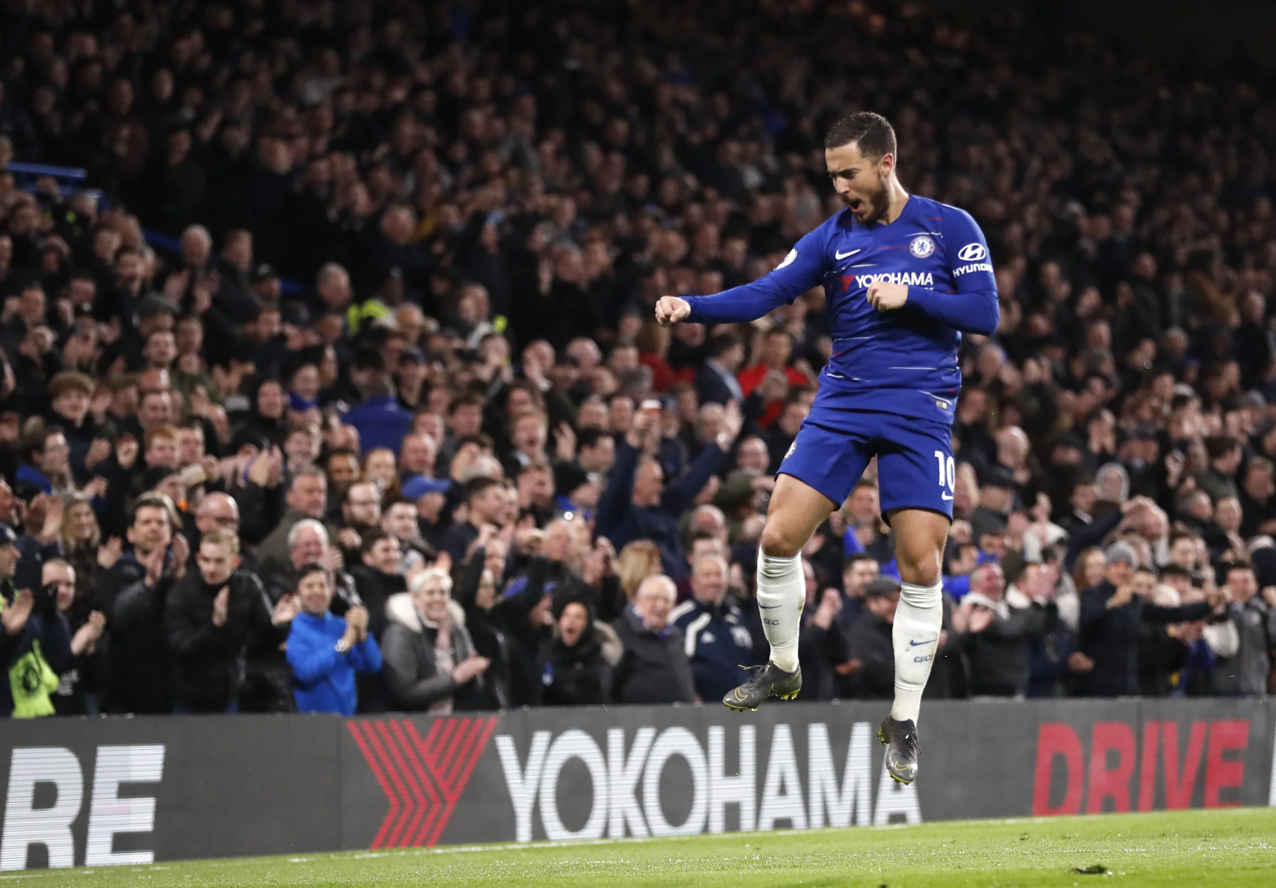 Chelsea's Eden Hazard celebrates after scoring his sides second goal during the English Premier League soccer match between Chelsea and Brighton &amp;amp; Hove Albion at Stamford Bridge stadium in London, Wednesday, April 3, 2019. (AP Photo/Frank Au…