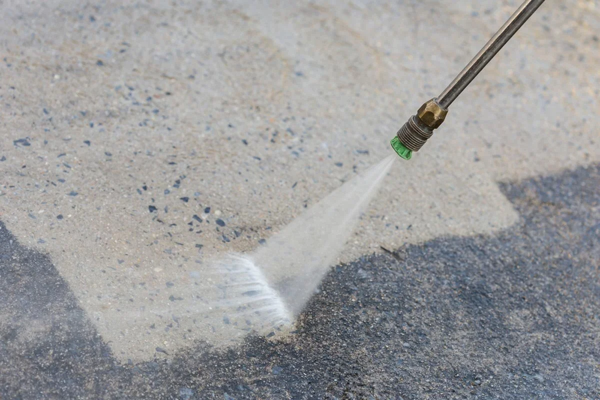 homeguide-pressure-washing-driveway-removing-mildew-and-dirt.jpg