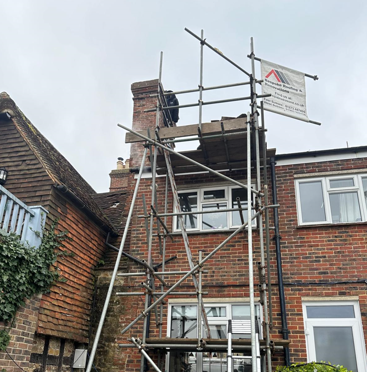Completed dark flat-roof covering on a Sussex property