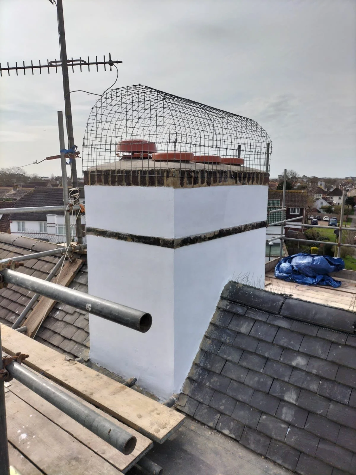 Completed chimney repair with new terminal details