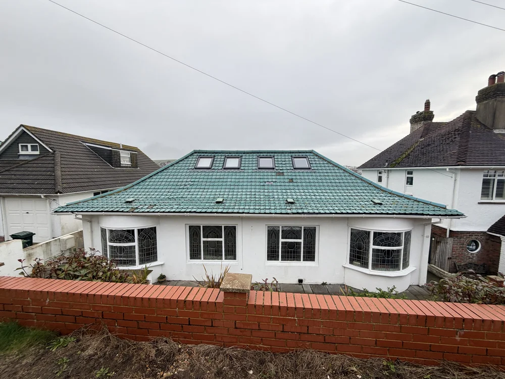 Completed blue tiled roof replacement in Saltdean, Brighton