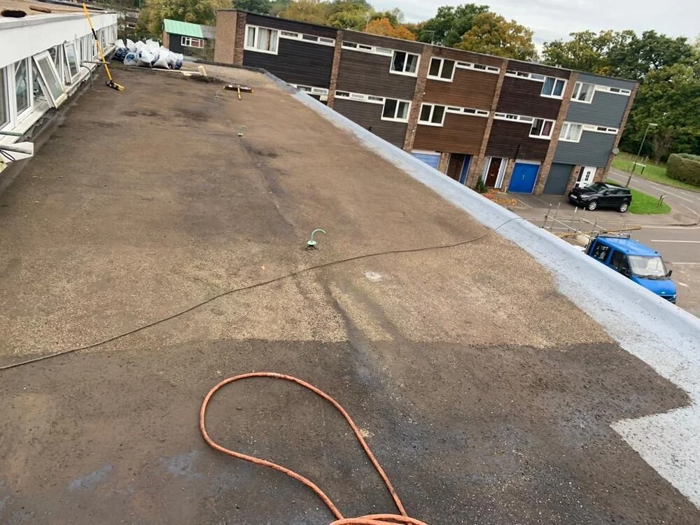 Existing flat roof inspected before renewal