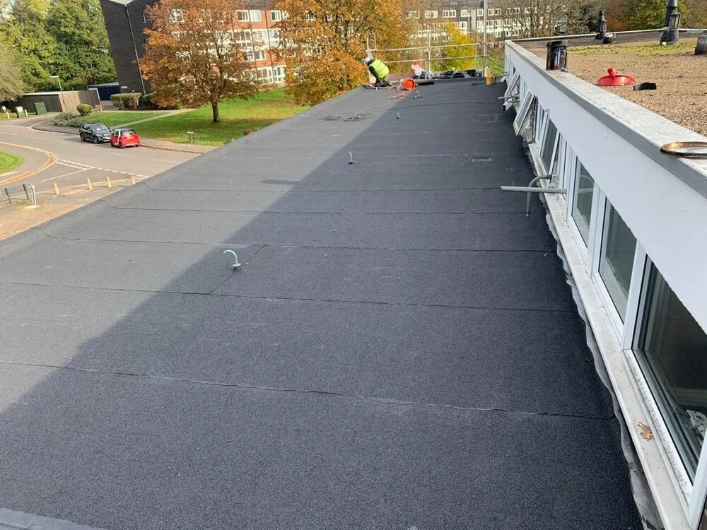 Completed mineral felt flat roof with tidy trims