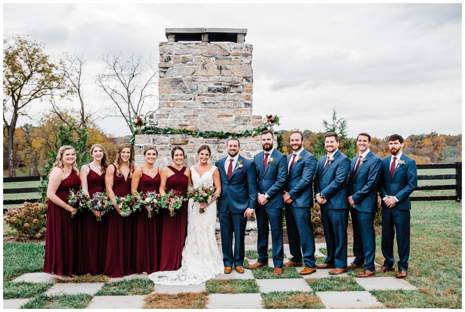Red August Farm Wedding bride and groom wedding party