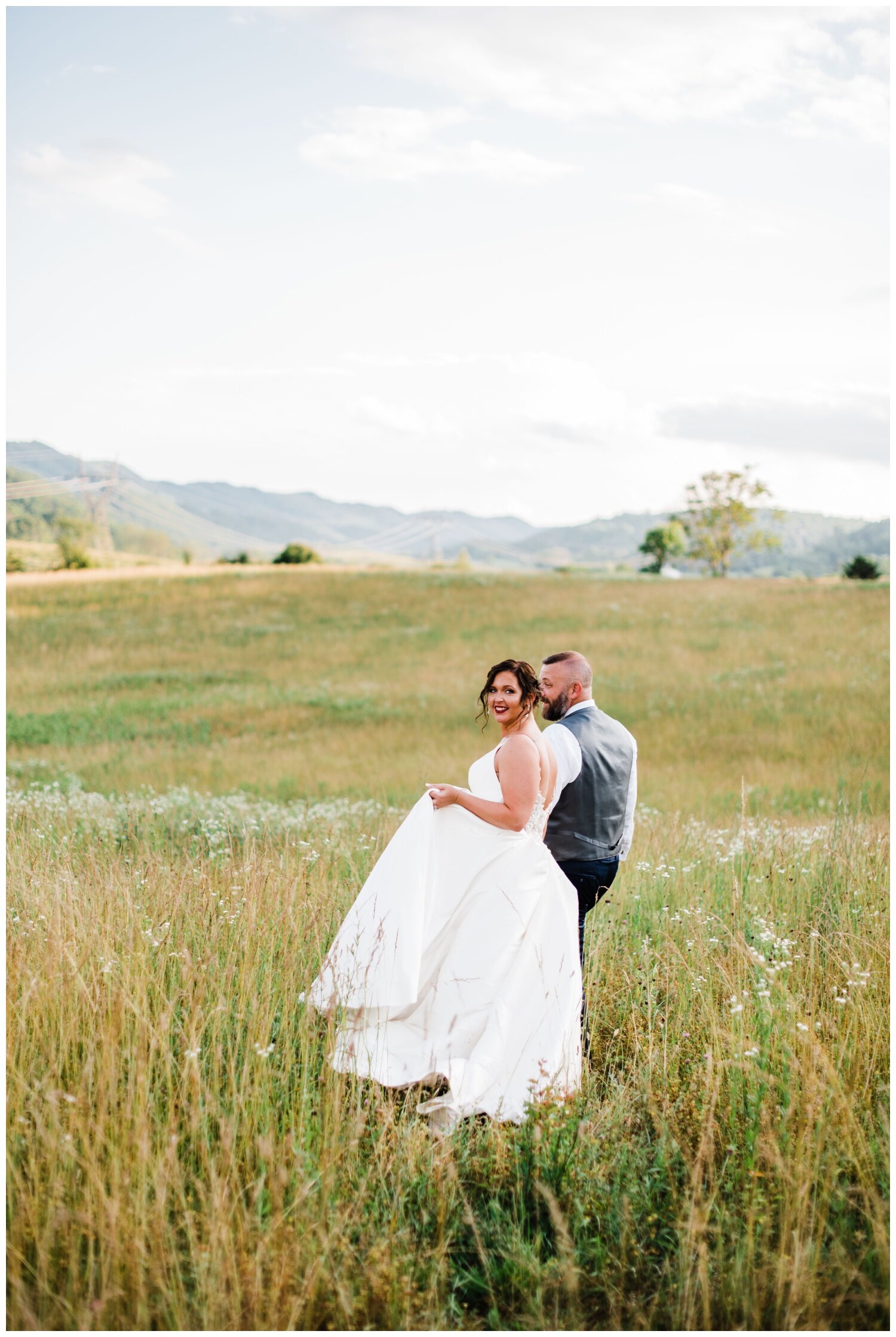 Triple J Farm Wedding bride and groom in field