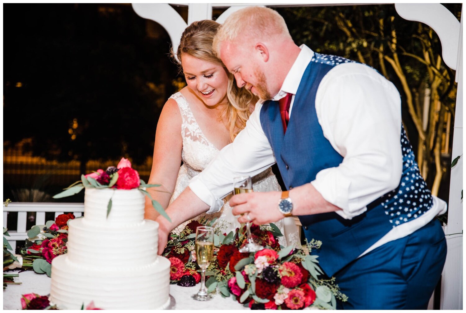 Birkby House Wedding bride and groom cut cake