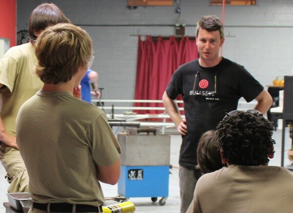 Glass Director Joe Grant works with kids in the Eckerd Connects program