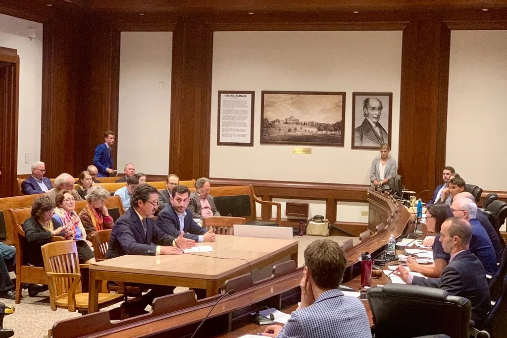 Richard Andre and Erik Peckar or Vineyard Power testifying to state legislators on behalf of Community Empowerment.