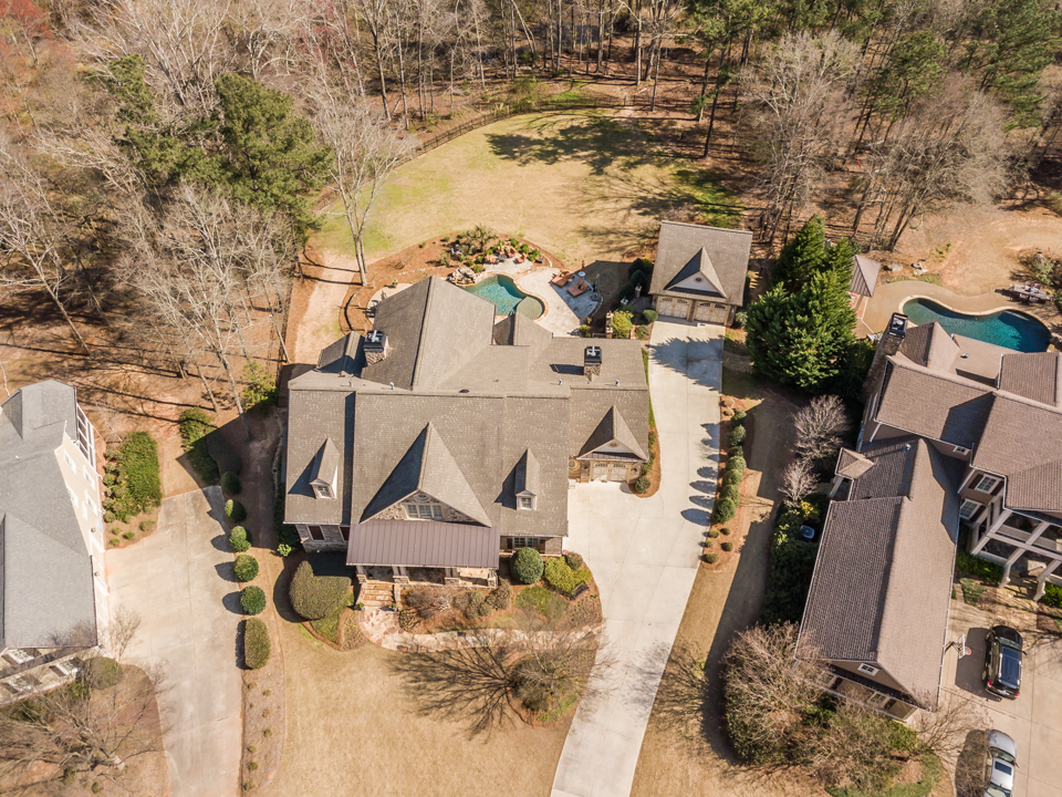 1310-longwood-park-$1,387,000-clubside-living-oconee-springs-courtyard-homes-house-for-sale-georgia-club-athens-sarah-lee-realtor-aerial-front-over-view.jpg