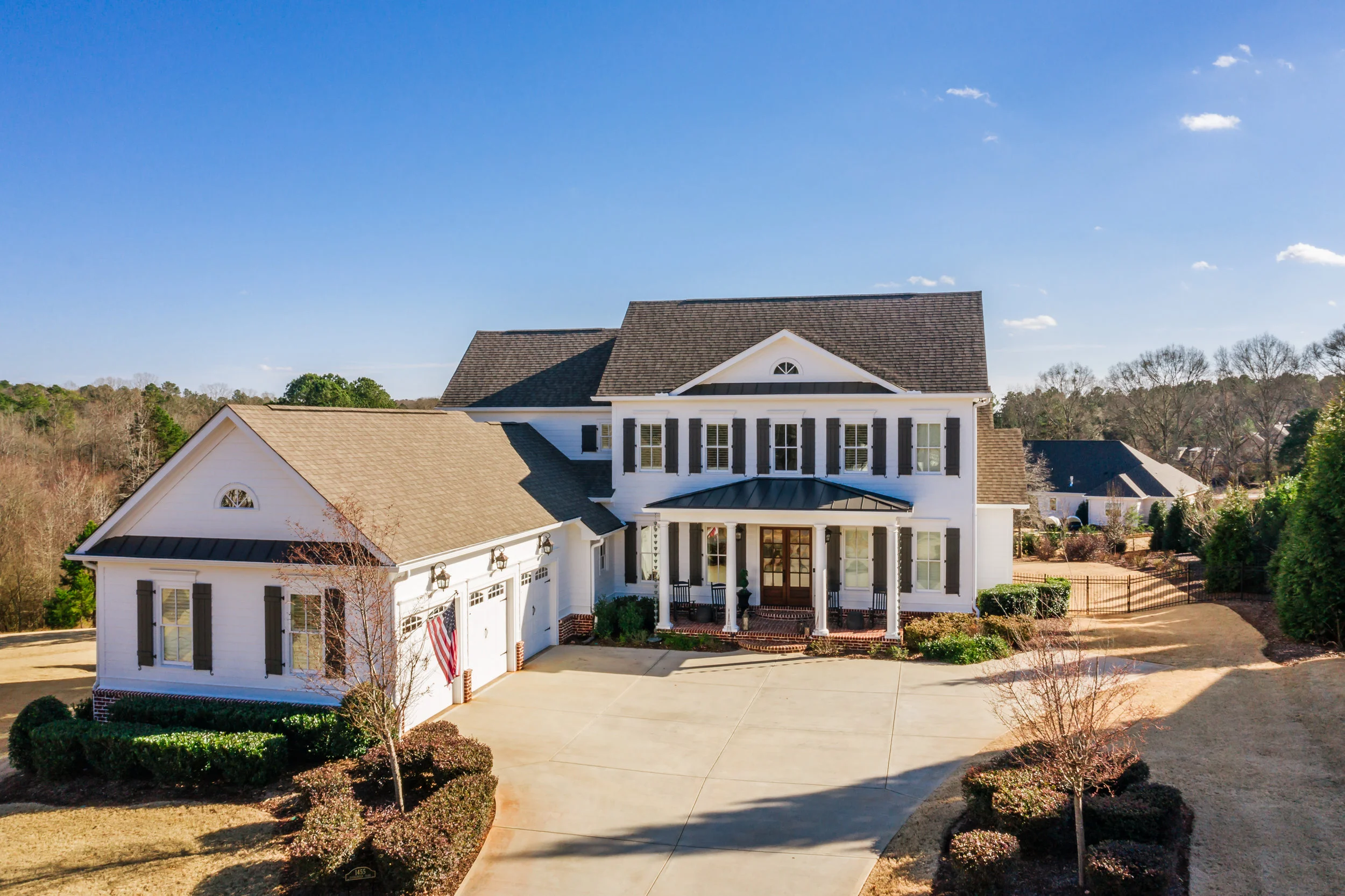 Luxury living at its best, in the areas number one Premiere Country Club Community... The Georgia Club! This custom built estate with resort-like pool, hot tub, and outdoor amenities boast true quality and craftsmanship. Many fine appointments grace this immaculate home, to include; Soaring Ceilings, Hardwoods, Coffered & Trey Ceilings, High-end Trim/Wood Molding, 2 fireplaces, Gourmet Kitchen w/Custom Cabinets, Granite Island, Commercial Grade Appliances, Wine Refrig, Keeping Rm. Oversized Master Suite w/ Luxurious Bath. Finished Terrace w/Office/BR, Bath, Bar, Rec & Pool Rm. Located on almost 1-acre lot w/Fantastic Outdoor Living area w/Gunite Pool, Hot tub. This house sits on the highest point in Oconee Springs, so you will sure enjoy the view from your back elevated porch. Call us today to see this home.