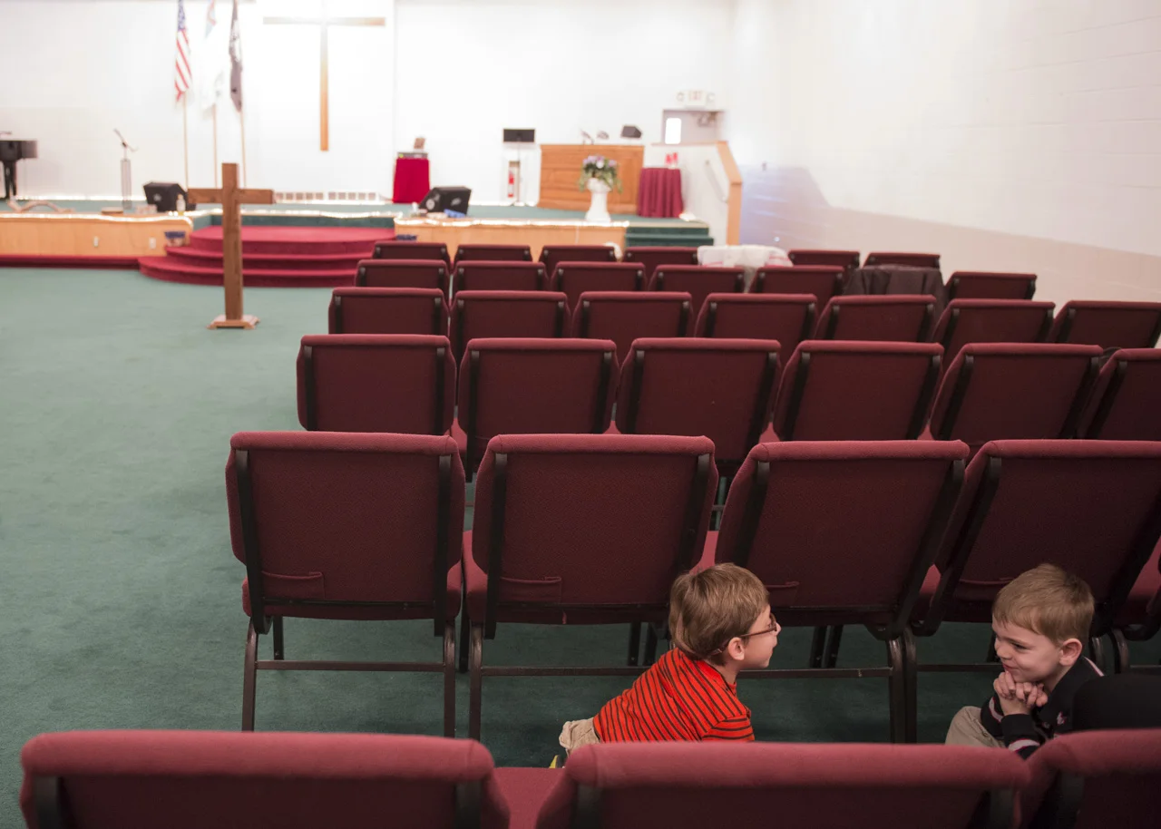  Josiah hides from his parents with six-year-old friend Noah King. They play and tell jokes before they go to Sunday school. 