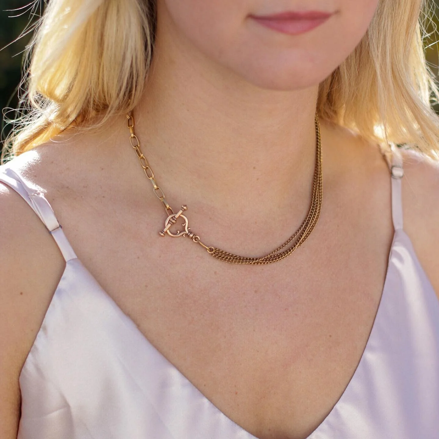 Meet Chloe and Lindsey! New necklaces designed with segments of vintage chain and our signature toggle. Both necklaces have our Forever Finish 18k Gold plating, allowing for extended wear without tarnish. Meaning they are perfect for beach, ball game, or backyard bbq!