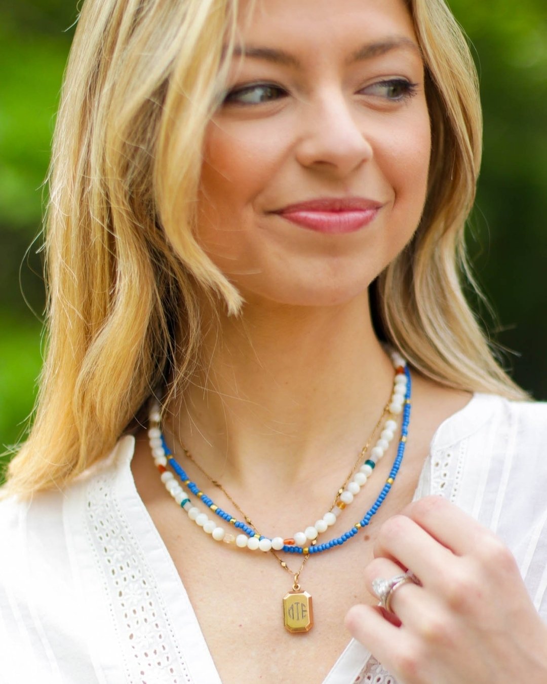 Add some life to the layers with cool tones for the season.
Semi precious stones like citrine, carnelian, apatite, and moonstone add an eclectic mix to a strand of mother of pearl in our Esther necklace. Vintage seed beads of blue and green add light