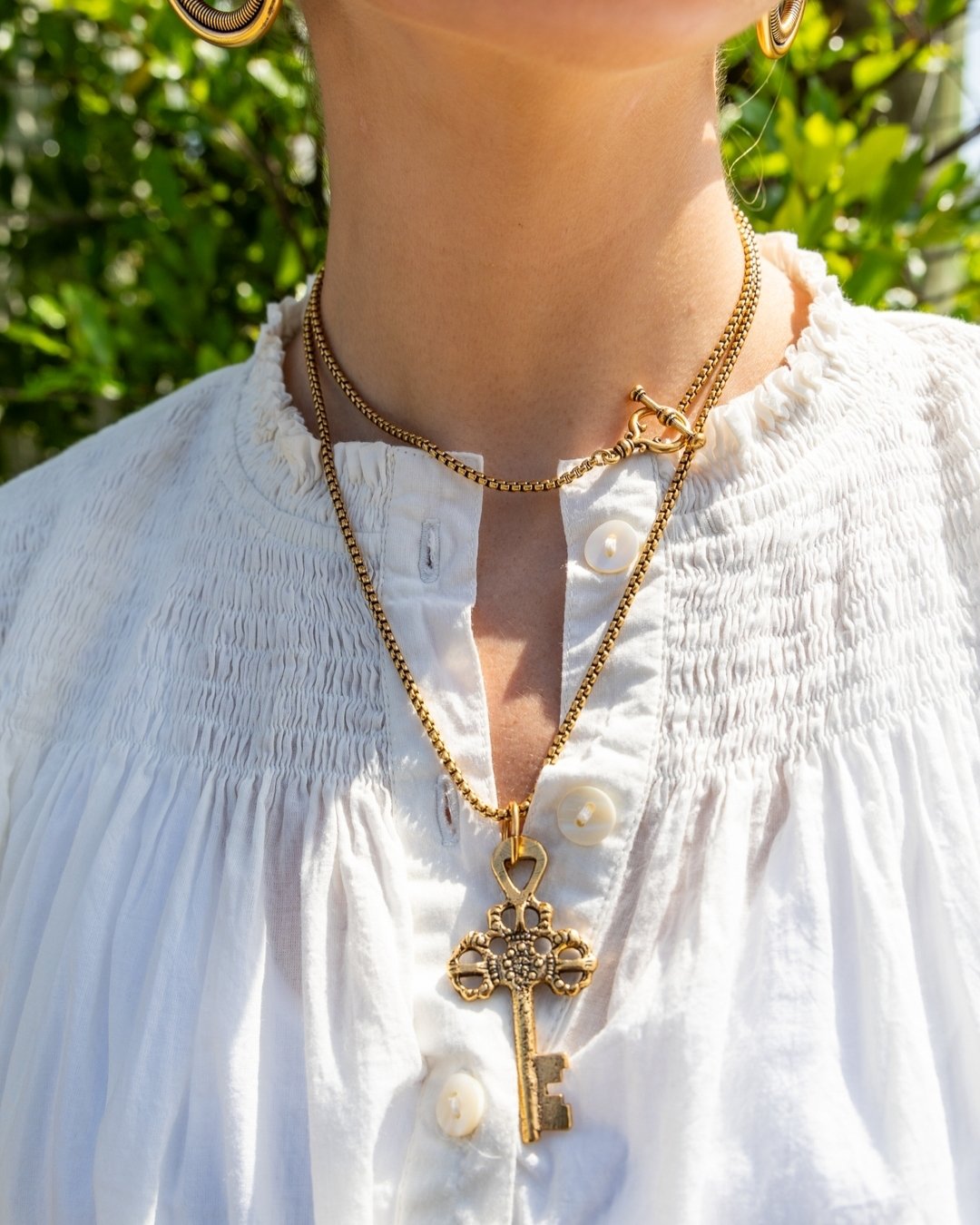 Introducing our NEW Tibetan Key! 
Our love for old keys knows no end. Cast from the original antique Tibetan key I discovered, this pendant is sold separately or on this 33&quot; vintage chain necklace. All gold plated in the USA, so it is lead-free,