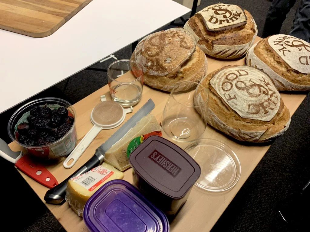  The prop table, including the four loaves I baked with various type treatments and score patterns. 