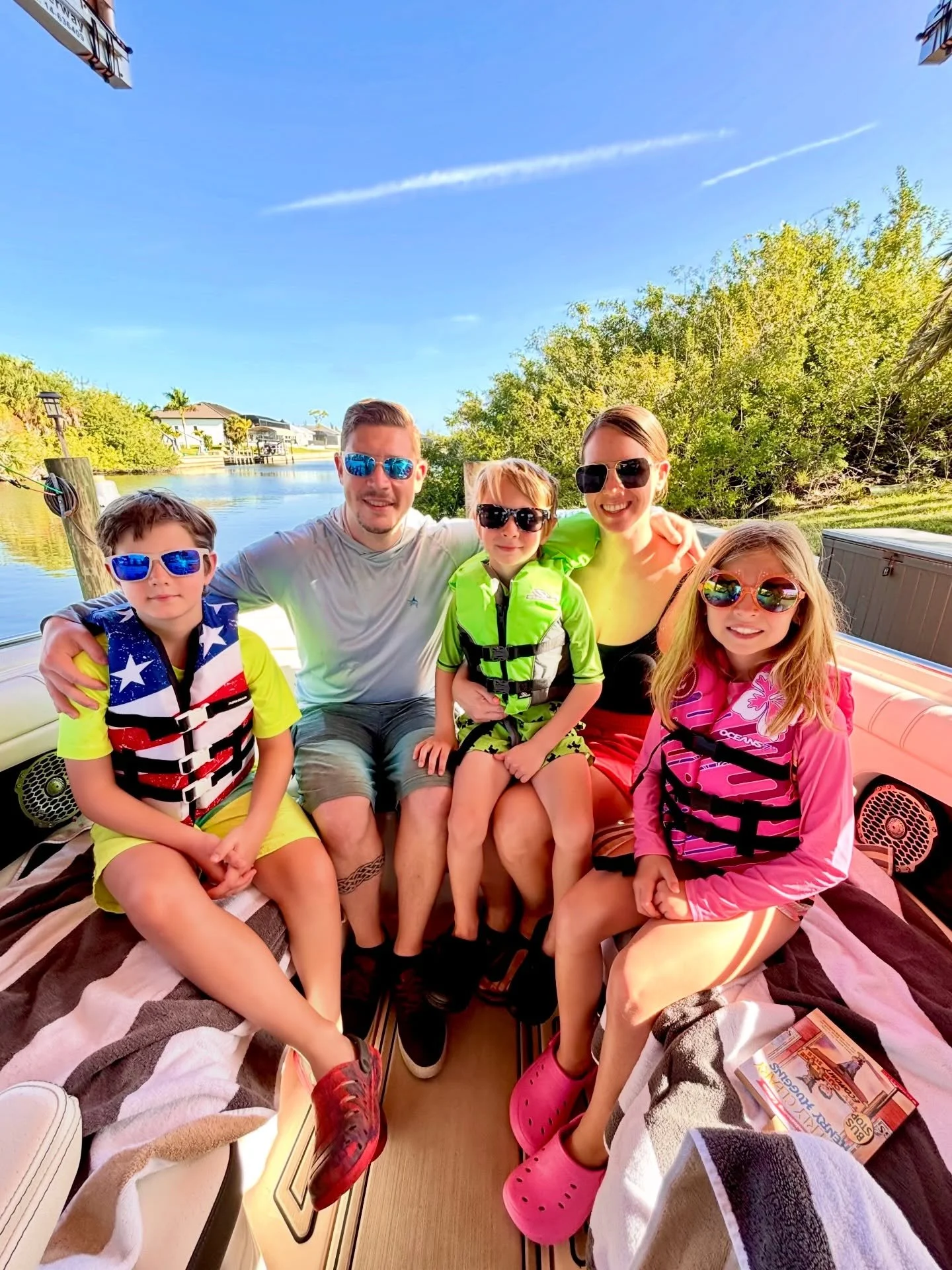 just a few highlights from an amazing week for spring break &lsquo;26 ☀️🌴😎 boat + pool days | sunshine + sunsets | fishing | ice cold bevs + good food | shark tooth necklaces | pirate cruisin + seeing a rocket launch to the moon | Palm Sunday + ear